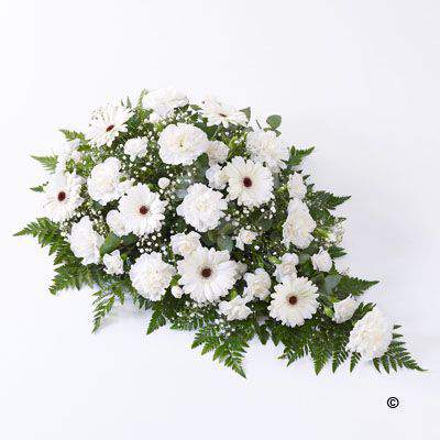 <h2>Classic Teardrop Spray in White | Funeral Flowers</h2>
<ul>
<li>Approximate Size W 45cm H 75cm</li>
<li>Hand created large white spray in fresh flowers</li>
<li>To give you the best we may occasionally need to make substitutes</li>
<li>Funeral Flowers will be delivered at least 2 hours before the funeral</li>
<li>For delivery area coverage see below</li>
</ul>
<br>
<h2>Liverpool Flower Delivery</h2>
<p>We have a wide selection of Funeral Sprays offered for Liverpool Flower Delivery. Funeral Sprays can be provided for you in Liverpool, Merseyside and we can organize Funeral flower deliveries for you nationwide. Funeral Flowers can be delivered to the Funeral directors or a house address. They can not be delivered to the crematorium or the church.</p>
<br>
<h2>Flower Delivery Coverage</h2>
<p>Our shop delivers funeral flowers to the following Liverpool postcodes L1 L2 L3 L4 L5 L6 L7 L8 L11 L12 L13 L14 L15 L16 L17 L18 L19 L24 L25 L26 L27 L36 L70 If your order is for an area outside of these we can organise delivery for you through our network of florists. We will ask them to make as close as possible to the image but because of the difference in stock and sundry items it may not be exact.</p>
<br>
<h2>Liverpool Funeral Flowers | Sprays</h2>
<p>This large traditional teardrop-shaped spray has been loving handcrafted by our expert florists. Fresh carnations, spray carnations, germini and gypsophilia, all in pristine white, are beautifully arranged together with dark green leather leaf and fragrant eucalyptus to finish this graceful tribute.</p>
<br>
<p>Funeral sprays are created in a teardrop shape and are sometimes called teardrop sprays. The flowers are arranged in floral foam, which means the flowers have a water source.</p>
<br>
<p>They are an appropriate arrangement expressing sympathy if you are family, friend or colleague of the deceased.</p>
<br>
<p>We recommend these rather than a funeral sheaf as the flowers are still drinking, so protected against wilting, especially when the funeral is held in the heat.</p>
<br>
<p>Contains 12 white carnations, 9 white germini, 3 white gypsophila, 7 white spray carnations and mixed foliage.</p>
<br>
<h2>Best Florist in Liverpool</h2>
<p>Trust Award-winning Liverpool Florist, Booker Flowers and Gifts, to deliver funeral flowers fitting for the occasion delivered in Liverpool, Merseyside and beyond. Our funeral flowers are handcrafted by our team of professional fully qualified who not only lovingly hand make our designs but hand-deliver them, ensuring all our customers are delighted with their flowers. Booker Flowers and Gifts your local Liverpool Flower shop.</p>
<br>
<p><em>Janice Crane - 5 Star Review on Google - Funeral Florist Liverpool</em></p>
<br>
<p><em>I recently had to order a floral tribute for my sister in laws funeral and the Booker Flowers team created a beautifully stunning arrangement. Thank you all so much, Janice Crane.</em></p>